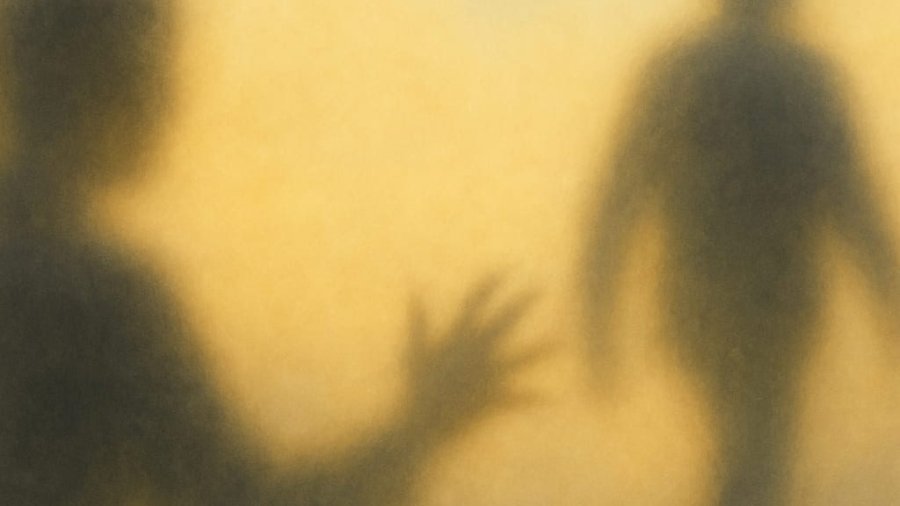 A blurred silhouette of one person reaching toward another walking away