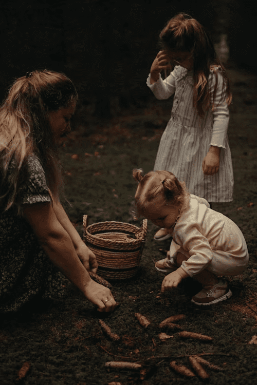 A child working in the farm with the parent