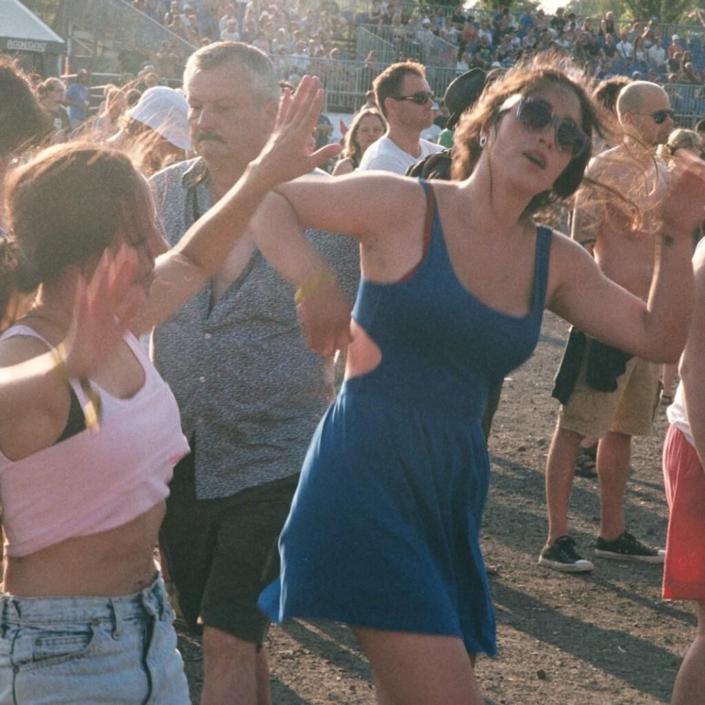 Friends dancing in synchronized movements