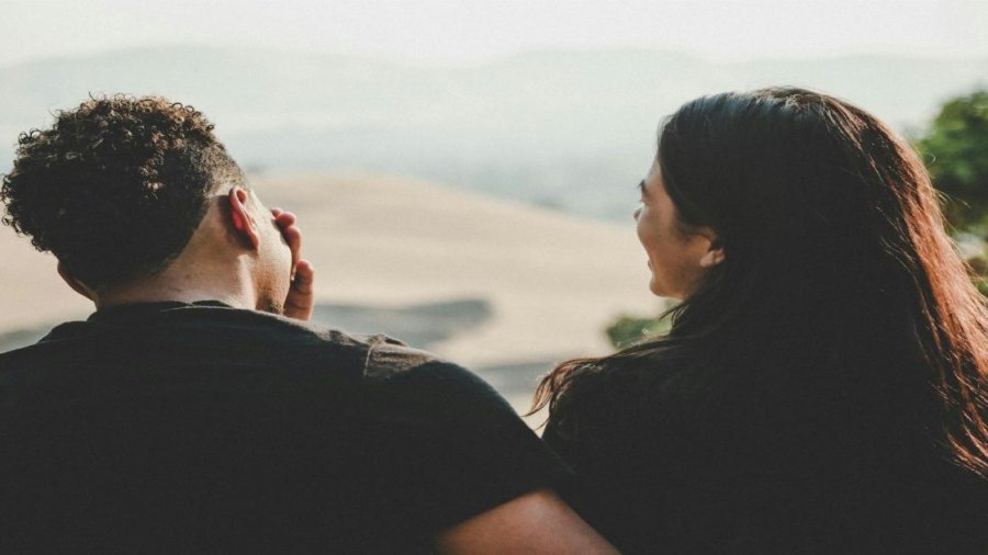 couple wears black shirt