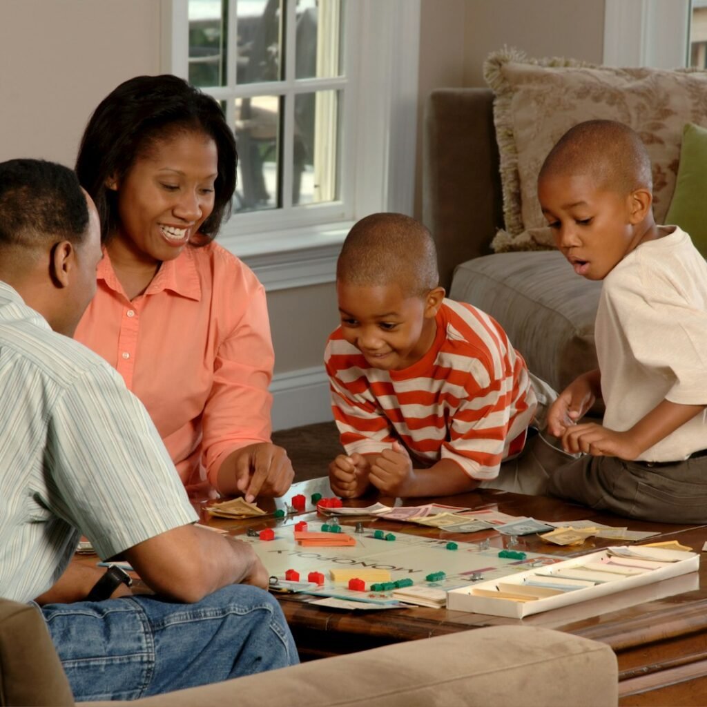 family playing board games showing the family reconnecting through play